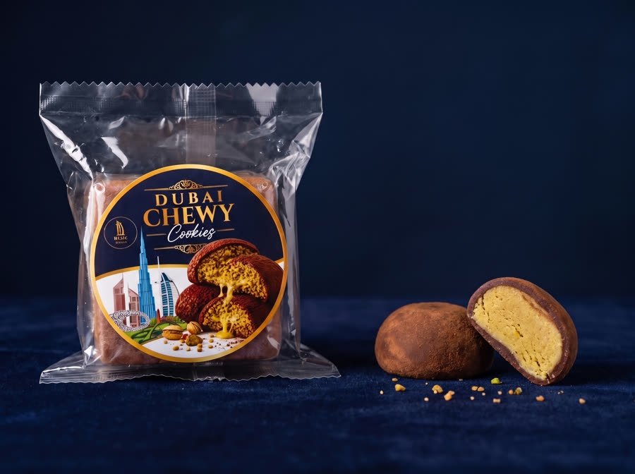 Dubai Chewy individually wrapped soft chewy dessert by Blue Dubai Sweets with one piece cut open to show the soft filling